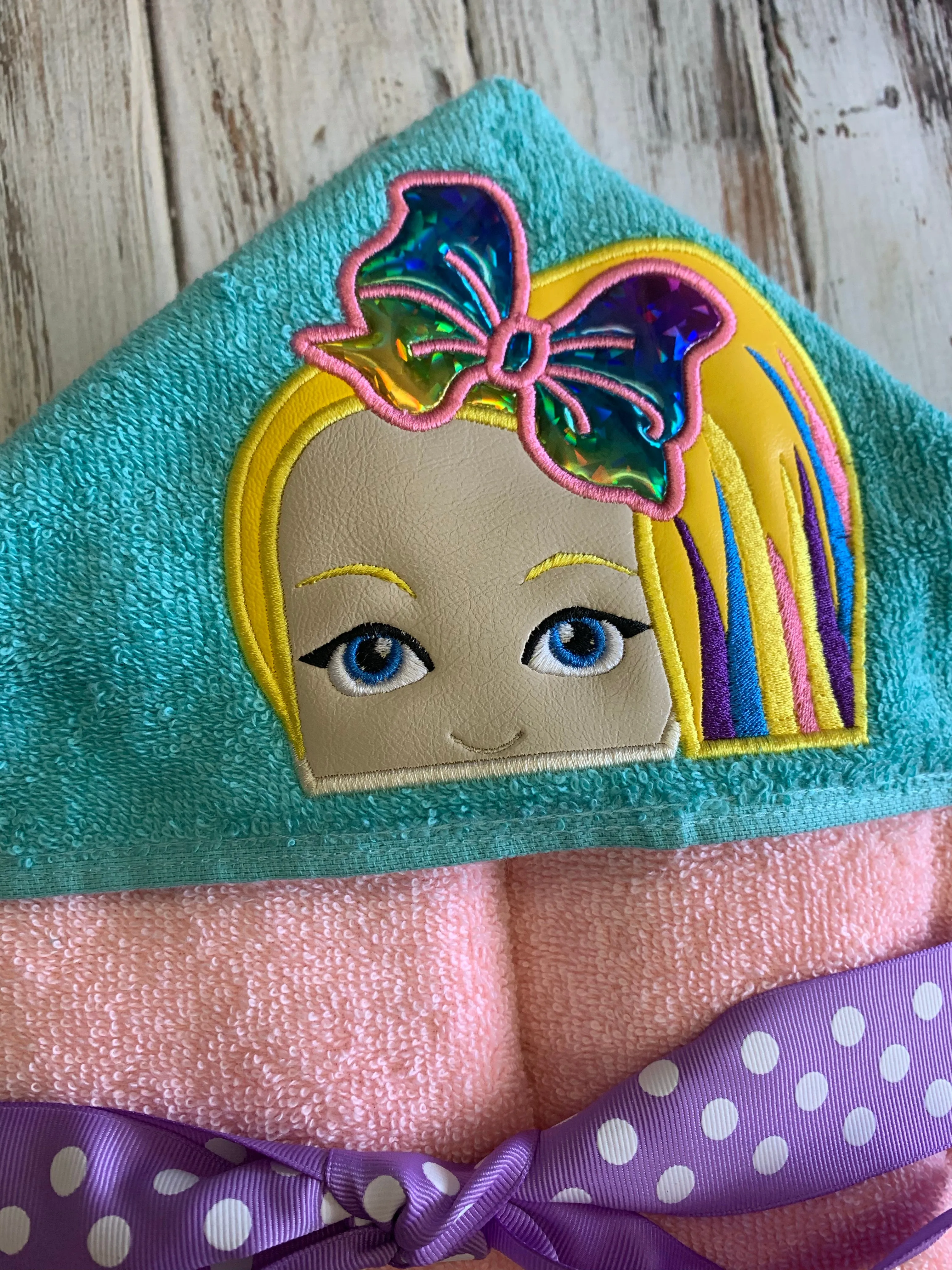 Girl with a Bow hooded towel