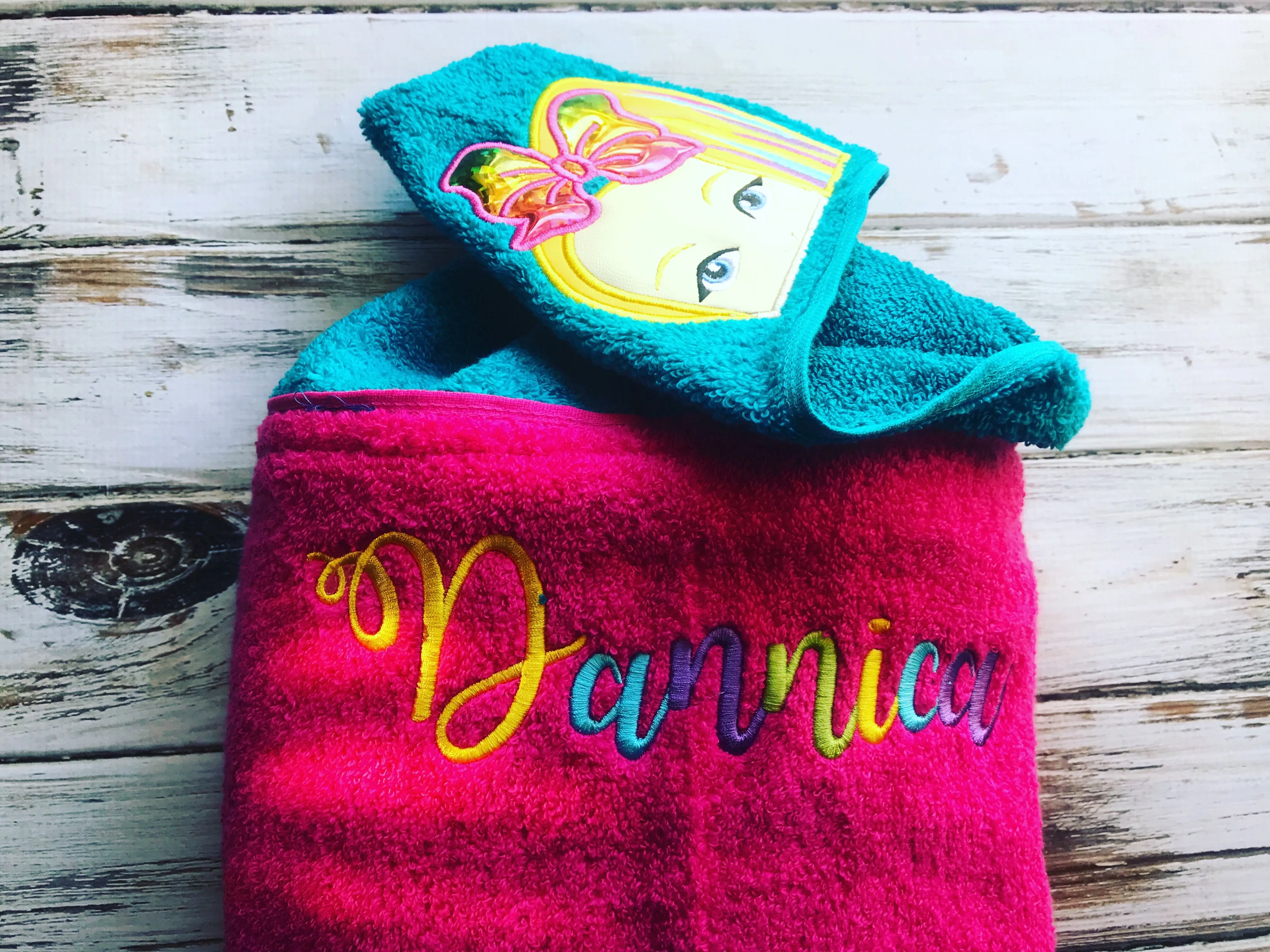 Girl with a Bow hooded towel