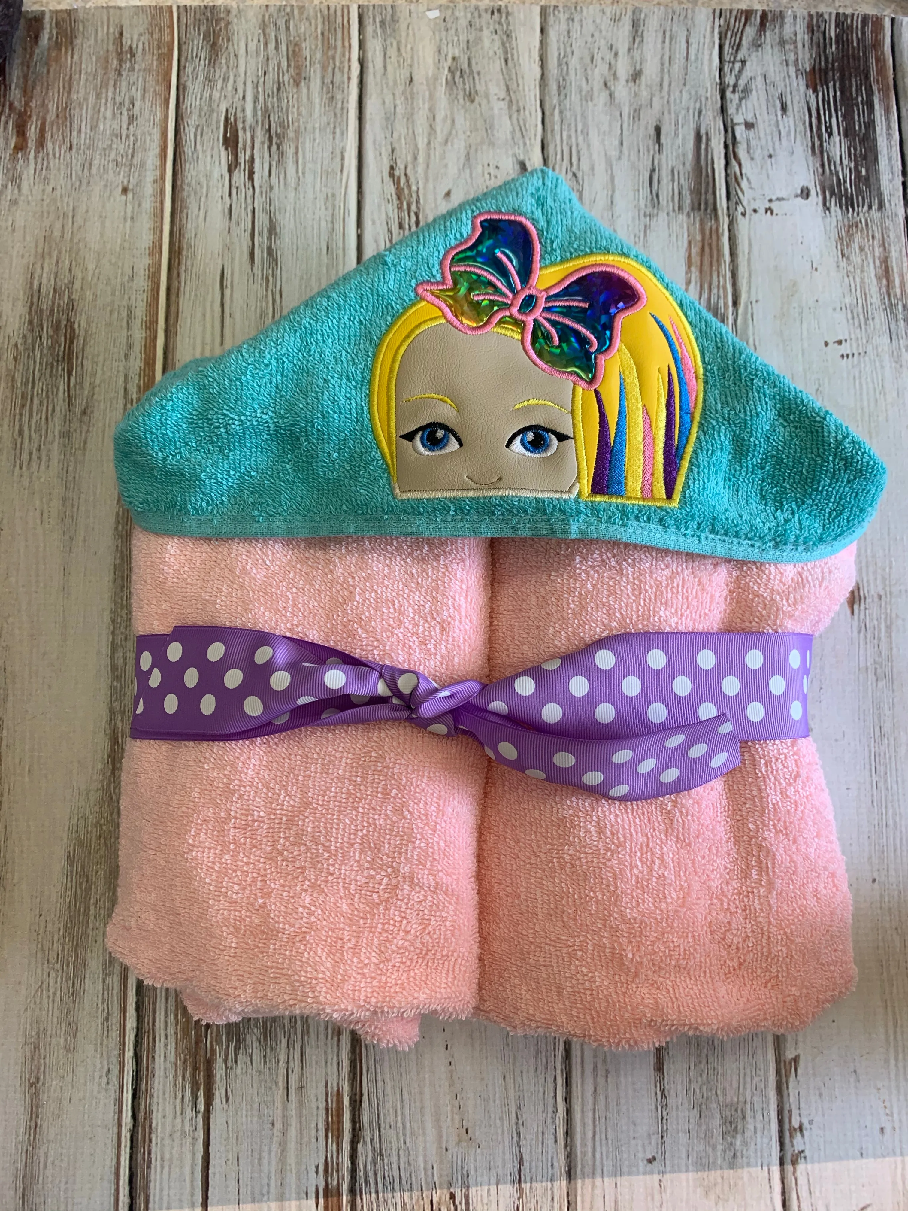 Girl with a Bow hooded towel